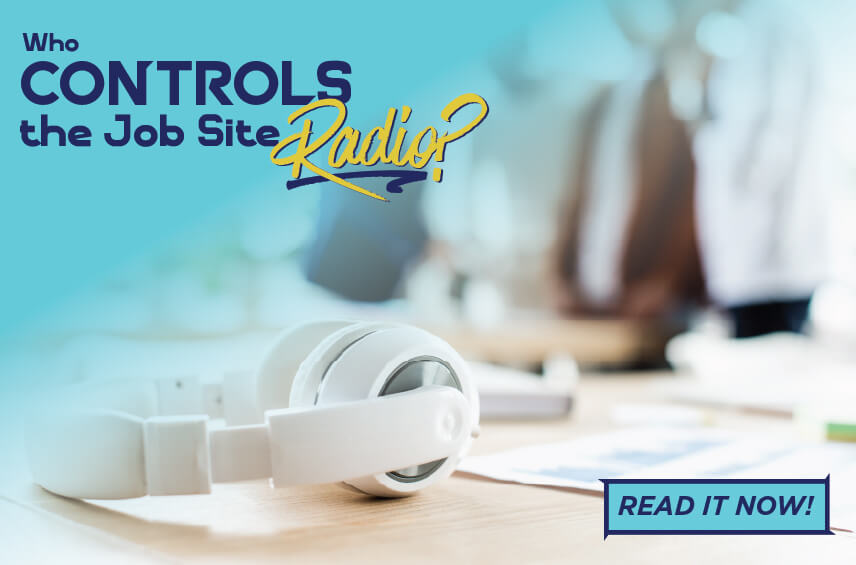 Blog post graphic featuring white over-ear headphones resting on a desk with a blurred office background. Overlaid text reads: 'Who CONTROLS the Job Site Radio?', with a 'READ IT NOW!' button in the bottom right corner.